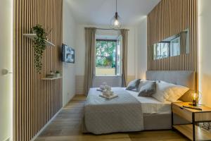 Imperium House - appartamento con giardino privato, 3 minuti da Metro Piazza Bologna, A-C,