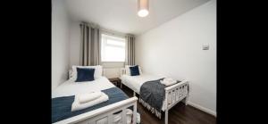 Spacious Chessington home with parking & garden