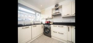Spacious Chessington home with parking & garden