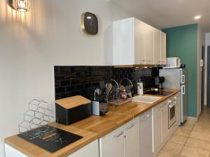 Appartements Le Loft CITY, au coeur du village : photos des chambres