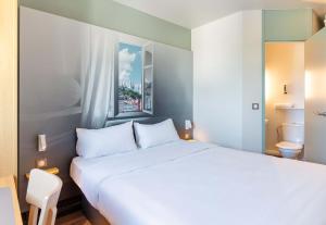 Hotels B&B HOTEL Lyon Saint-Bonnet Mi-Plaine : photos des chambres