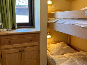 Appartement spacieux aux Gets, pied des pistes, balcon sud-ouest, 2 chambres, coin cabine, garage, WiFi - FR-1-623-81