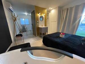 Appartements Studio M romantisme et elegance : photos des chambres
