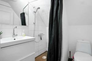 Lejlighedrækkehus med adgang til pool.