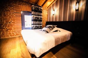 Hotels Les Ecuries de la Tour : photos des chambres