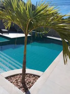 Casa charmosa em condomínio - 布希奥斯