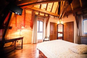 Hotels Les Ecuries de la Tour : photos des chambres