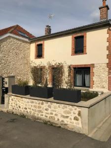 Appartements Agreable maison petit jardin a 7 minutes de Reims : photos des chambres