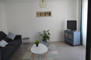 Appartements Agreable maison petit jardin a 7 minutes de Reims : photos des chambres