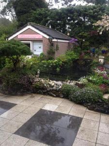 Romantisch Tiny Gardenhouse in beautiful garden