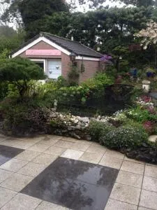 Romantisch Tiny Gardenhouse in beautiful garden - Bentveld