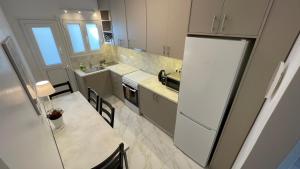 2 Newly Renovated Charming Apartments steps from Panormou Metro Station