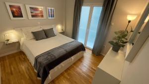 2 Newly Renovated Charming Apartments steps from Panormou Metro Station