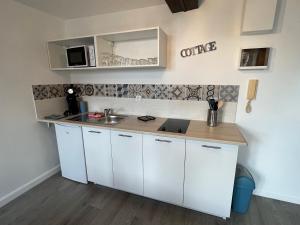 Appartements Studio centre ville le saint'oh : photos des chambres