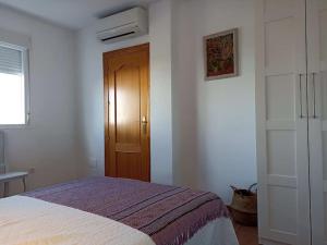 Adosado en playa Vera,3 piscinas