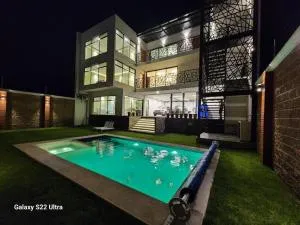 Casa Beily con alberca climatizada - 阿特利斯科