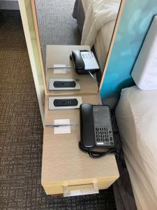 1 Bedroom 2 room Suite, 1 King, Sofa bed room in Courtyard Detroit Brighton