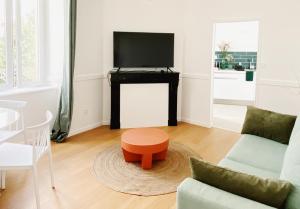 Appartements Le TerraCotta ⸱ Stationnement gratuit ⸱ Fibre : photos des chambres