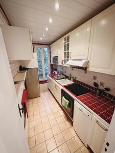 Appartements La Suite - Charmant duplex proche Paris : photos des chambres