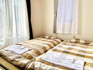 JOY IN民宿两站关西机场一站奥莱，整租，提供机场接送服务,步行可达便利店、免税购物中心、药妆店