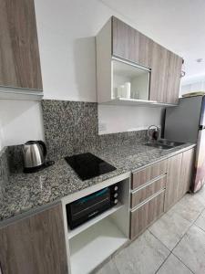 DEPARTAMENTo EN COMPLEJO RESIDENCIAL CON COCHERA