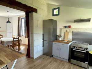 Maisons de vacances Chez Juliette - Maison et jardin - bord de Loire a Saumur : photos des chambres