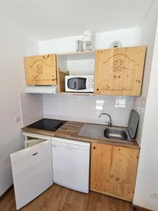 Appartements Les 3 Vallees - Hameau des eaux d'Orelle - Appartement 003 : photos des chambres