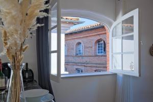 Appartements Numero 6 - Place Nationale - Wifi et Fibre : photos des chambres