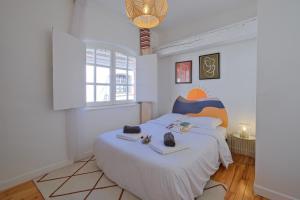 Appartements Numero 6 - Place Nationale - Wifi et Fibre : photos des chambres