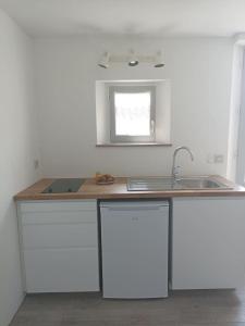 Appartements charmant studio dans une longere : photos des chambres
