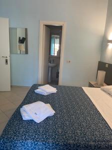 Studio (3 Adults) room in Residence Lodi