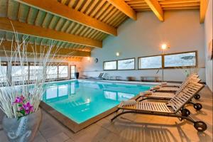 Appartements Les 3 vallees - Piscine/Spa/Hammam - 4p : photos des chambres