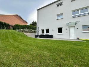 Modernes Apartment mit eigener Terrasse & Garten