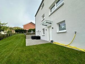 Modernes Apartment mit eigener Terrasse & Garten