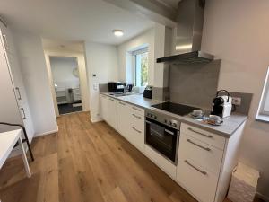 Modernes Apartment mit eigener Terrasse & Garten