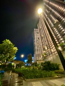 Cozy 1 BR ScandinavianTropical Condo with Balcony & Parking