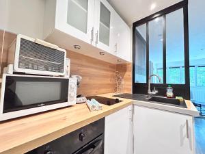 Appartements Le Beaune - Appartement Clermont Ferrand : photos des chambres