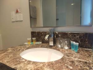 WinJ Management at South China Sea Place