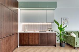 DOKI Living - Foodhall & Parking by Downtown Apartments