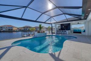 New listing - Amazing new 3beds3baths Gulf access villa w. heated pool and outdoor kitchen!