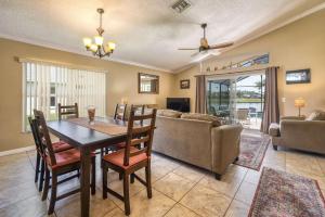 Charming 3BR home in Kissimmee with private pool and lake view, perfect for families.