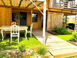 Maisons de vacances Charmant logement en bord de riviere et proche de la gare du Mans : photos des chambres