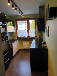 Przestronny apartament dla 9 osób - 4 sypialnie, PARKING - 4hvězdičkové hotely ve městě Hlivice