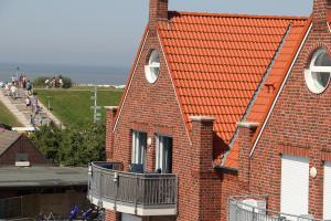 Ferienwohnung Meeresblick Norddeich mit Balkon