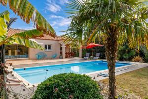 Maisons de vacances Maison pour 6 - Piscine et detente : photos des chambres