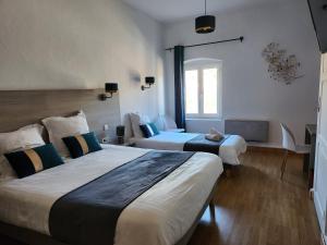 Hotels Hotel Des Negociants : photos des chambres