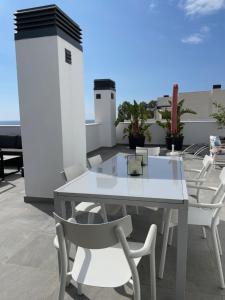 Sunny penthouse beach apartment with panoramic views