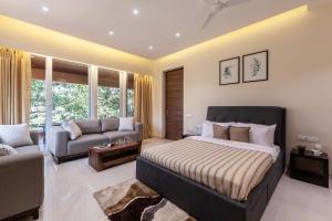 Inara by StayVista - Amidst lush greenery with Outdoor swimming pool & Indoor games