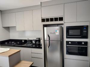 Pe na areia - 50m praia - 2 km aeroporto Navegantes -11 km Beto Carrero - 19 km de Balneario Camburiu SC