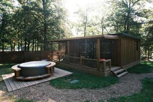 Chalets Lodge avec SPA privatif - Foret et Lac : photos des chambres